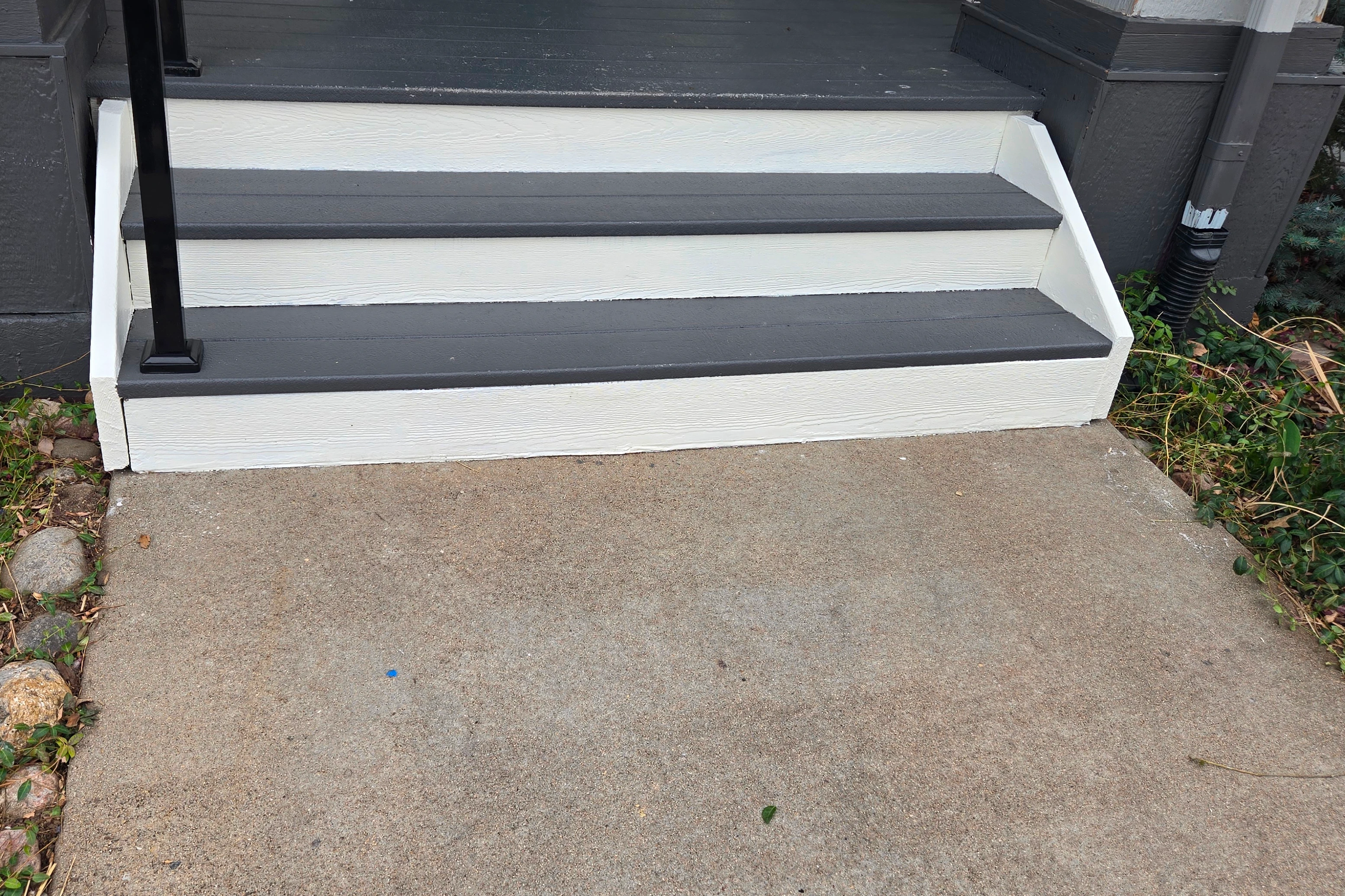 After Deck Repair and painting of rotted wood stairs